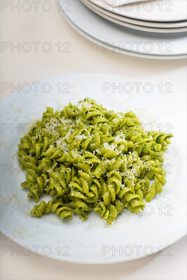 Italian fusilli pasta and fresh homemade pesto sauce