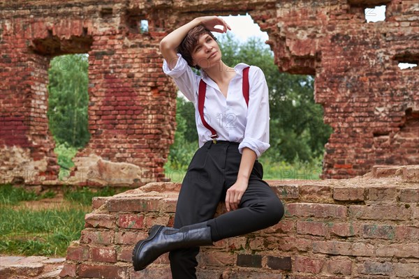 Image of a stylish beautiful woman in a white shirt