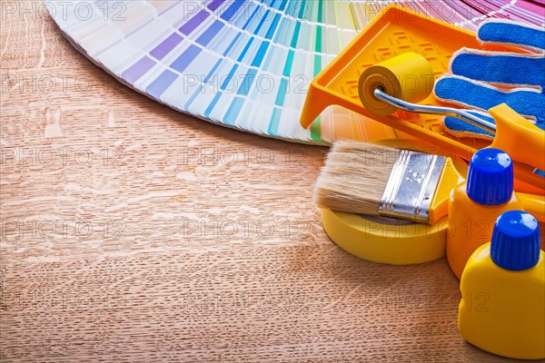 Colour tools and Pantone colour palettes Guide on wooden panel Maintenance concept