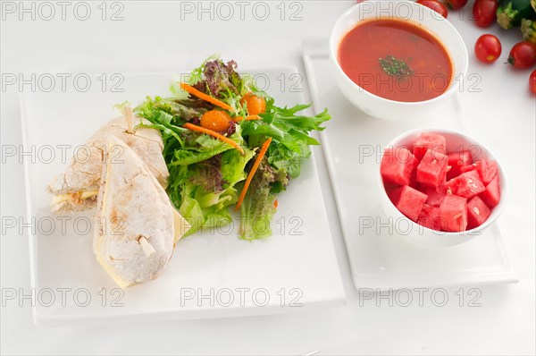 Tuna fish and cheese sandwich with fresh mixed salad