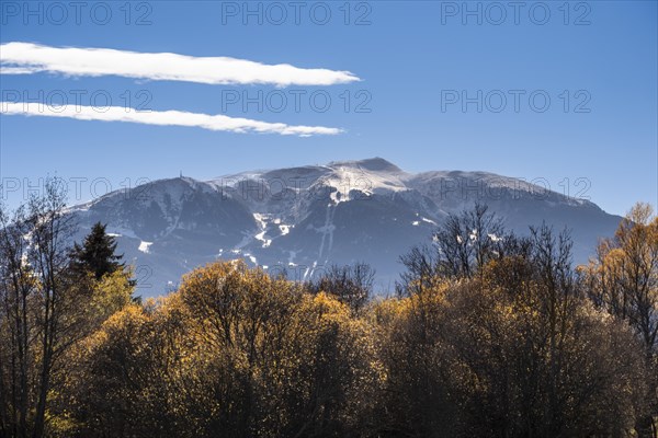 Autumn landscape in the Cerdanya area with snow-capped mountains in the background in the province of Gerona in Catalonia in Spain