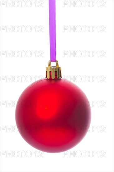 Hanging single red christmas ball isolated on white background