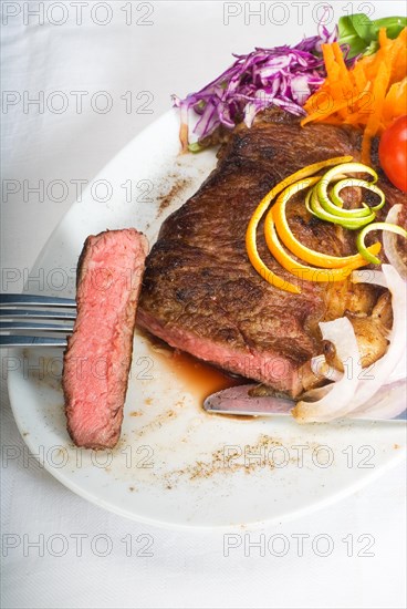 Fresh juicy beef ribeye steak sliced