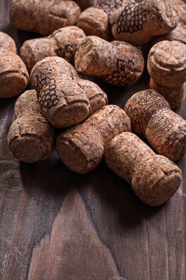 Champagne cork on a dark wooden board