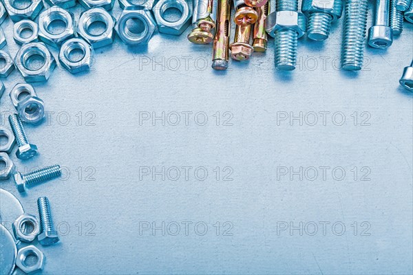 Pile of metal construction equipment on metallic background repair concept