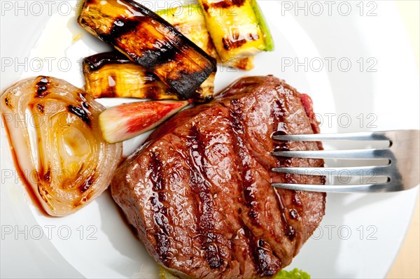 Grilled fresh beef filet mignon and vegetables