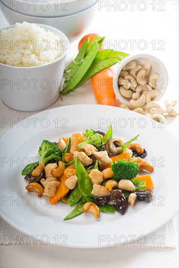 Fresh chicken and vegetables stir fried with cashew nuts