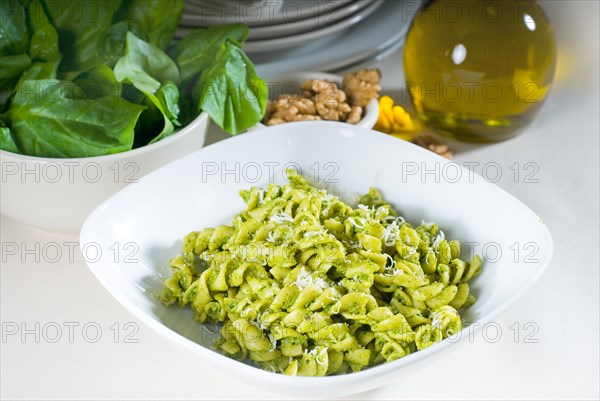 Italian fusilli pasta and fresh homemade pesto sauce