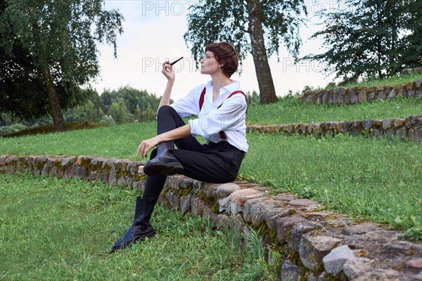 Image of a stylish beautiful woman in a white shirt