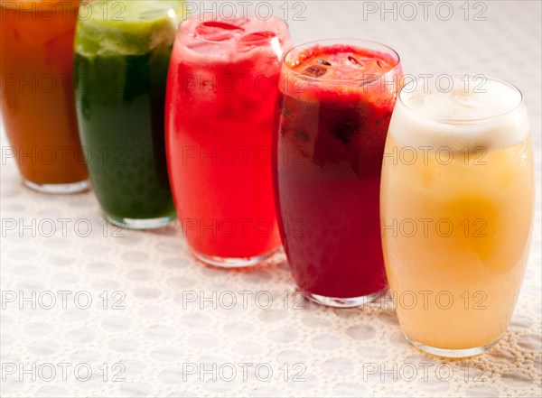 Selection of fresh fruits colorful long drink cocktails