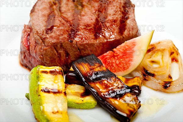 Grilled fresh beef filet mignon and vegetables
