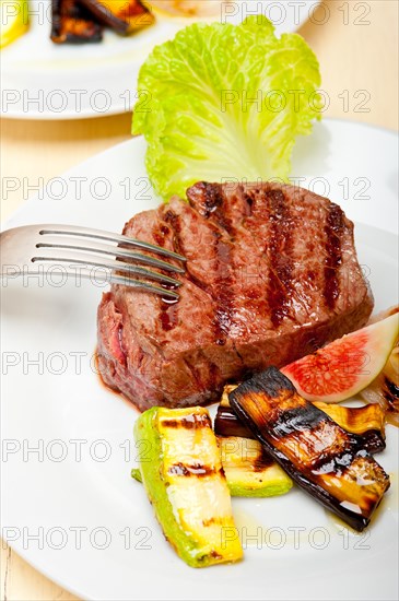 Grilled fresh beef filet mignon and vegetables