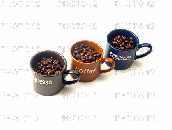 Coffee espresso cappuccino cups with coffee beans isolated on white background