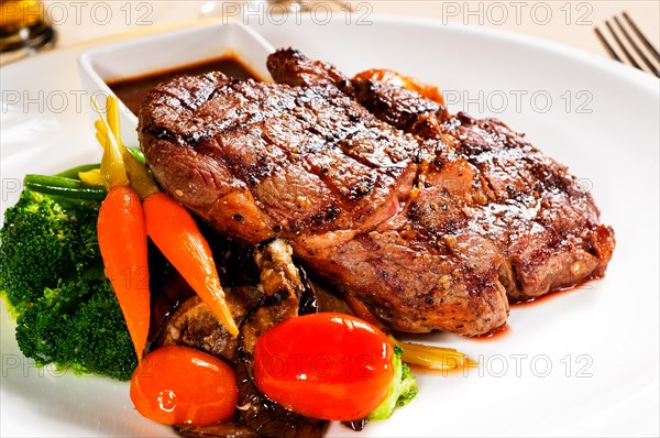 Fresh grilled ribeye steak with broccoli