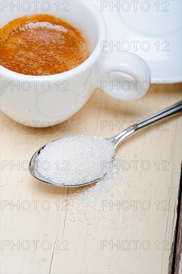 Italian espresso coffee over white wood table