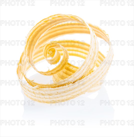Single wood shaving in front of a white background