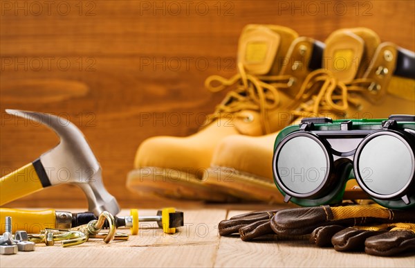 Safety goggles on Glowes with other tools