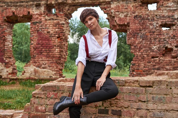 Image of a stylish beautiful woman in a white shirt