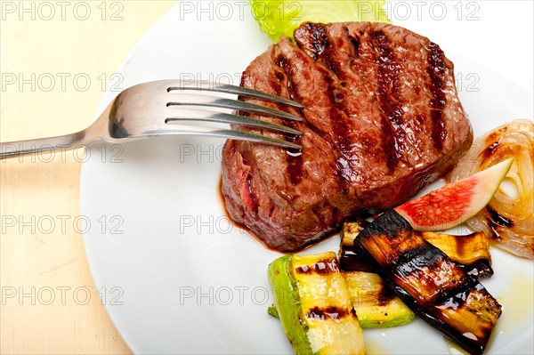 Grilled fresh beef filet mignon and vegetables