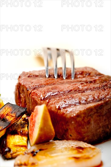 Grilled fresh beef filet mignon and vegetables