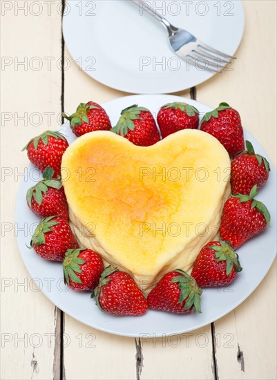 Heart shaped cheesecake with strawberryes ideal cake for valentine day