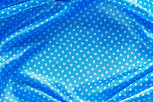 Blue polka-dot cotton fabric top view