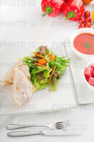 Tuna fish and cheese sandwich with fresh mixed salad