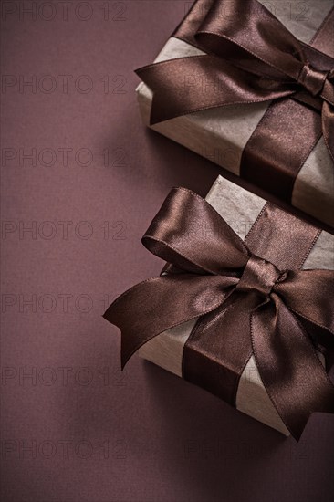 Birthday present boxes on brown background holidays concept