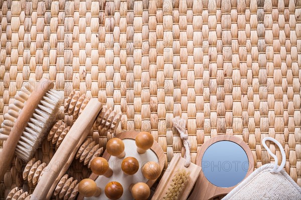 Horizontal view of sauna articles on a wicker mat Health concept