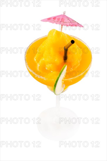 Frozen mango margarita daiquiri with lime black straw and pink umbrella isolated on white background