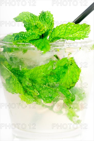 Mojito caipirina cocktail with fresh mint leaves