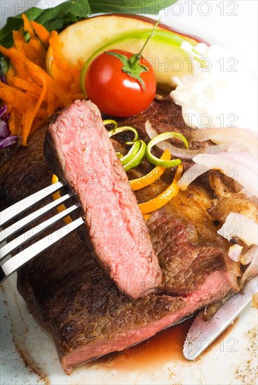 Fresh juicy beef ribeye steak sliced