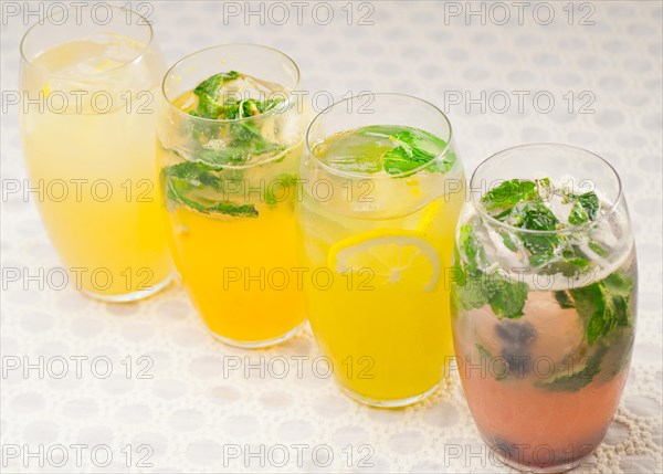 Selection of fresh fruits colorful long drink cocktails