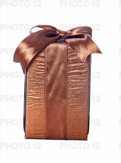 Brown vintage gift box against a white background