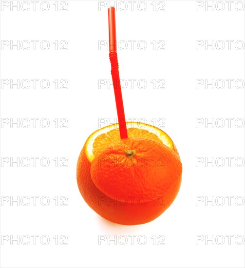 Fresh ripe orange cutted on top with straw on white background