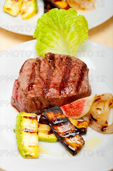 Grilled fresh beef filet mignon and vegetables