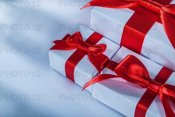 Composition of red gift boxes on white background