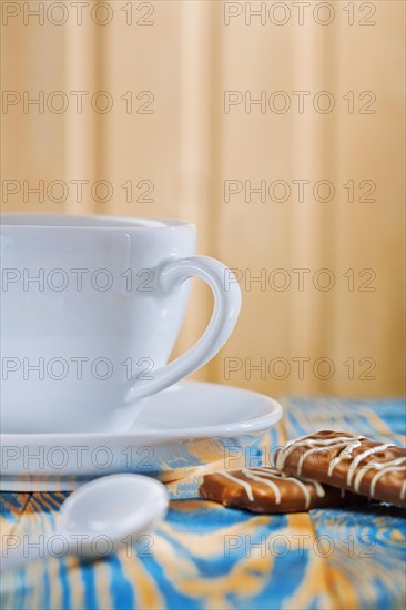 Coffee cup and biscuits