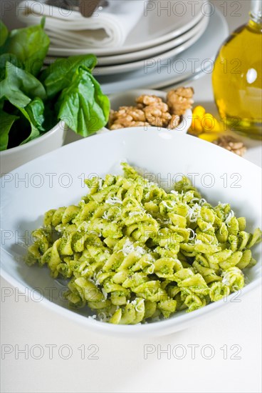 Italian fusilli pasta and fresh homemade pesto sauce