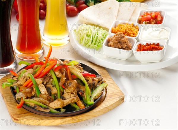 Original fajita sizzling smoking hot served on iron plate