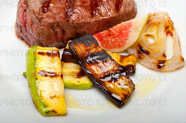 Grilled fresh beef filet mignon and vegetables