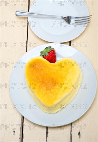 Heart shaped cheesecake with strawberryes ideal cake for valentine day