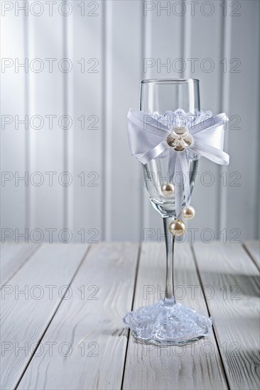 Single wine glasses wedding decorated