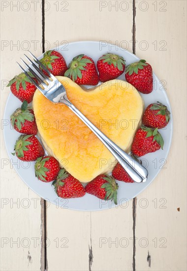 Heart shaped cheesecake with strawberryes ideal cake for valentine day