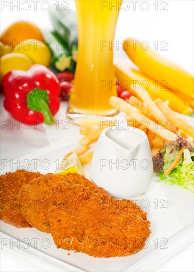 Classic breaded Milanese veal cutlets with french fries