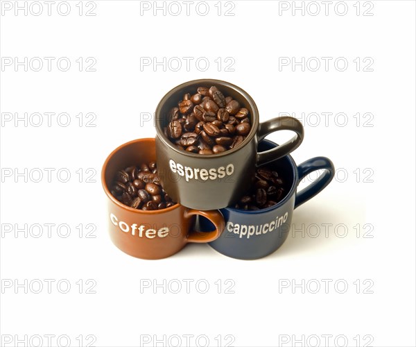 Coffee espresso cappuccino cups with coffee beans isolated on white background