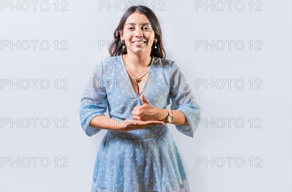 Girl gesturing help with hands in sign language. Person showing help gesture with hands in sign language