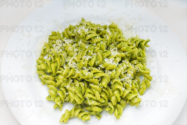 Italian fusilli pasta and fresh homemade pesto sauce