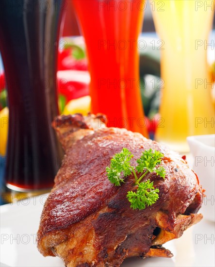 Original German BBQ pork knuckle served with mashed potatoes and sauerkraut