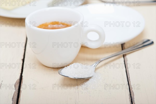 Italian espresso coffee over white wood table